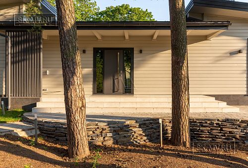 Фотографии П-образного дома в скандинавском стиле 238 кв м с панорамным остеклением, построенного в Сестрорецке - 11