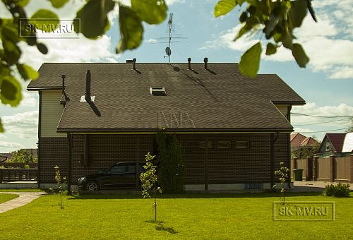 Строительство двухэтажного каркасного коттеджа шале около 300 кв м с комбинированной отделкой коричневым кирпичом и деревом в п Володарский - 31