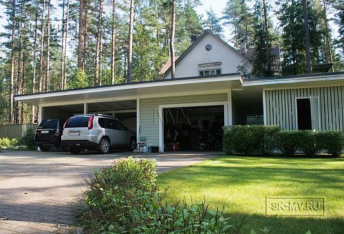 Построенный каркасный дом с комбинированной фасадной отделкой кирпичом и вагонкой в п Комарово - 4