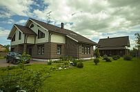 Строительство двухэтажного каркасного коттеджа шале около 300 кв м с комбинированной отделкой коричневым кирпичом и деревом в п Володарский - мини - 6