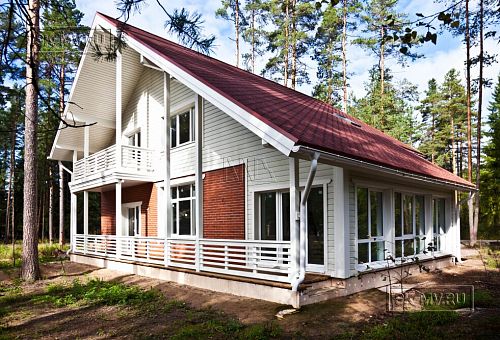 Строительство каркасного коттеджа 220 кв м аля шале с широкими кровельными свесами и остекленной верандой в комбинированной фасадной отделке красным лицевым кирпичом и белым имитатором бруса в п Вырица - 10