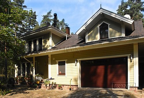 Построенный двухэтажный каркасный коттедж в комаровском стиле в п Комарово - 2