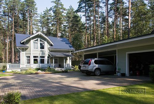 Построенный каркасный дом с комбинированной фасадной отделкой кирпичом и вагонкой в п Комарово - 9