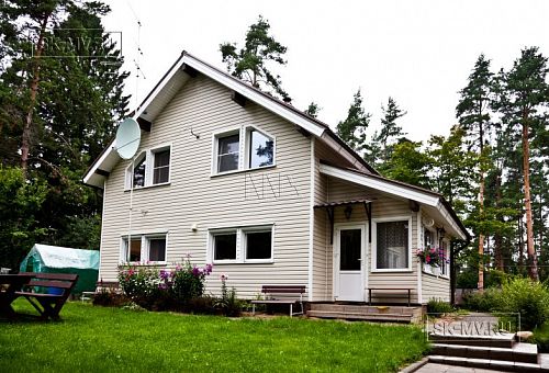 Строительство небольшого теплого зимнего двухэтажного каркасного коттеджа с сауной и верандой в Токсово - 1