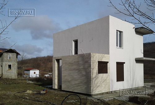 Небольшой газобетонный загородный дом в стиле хай тек строится в КП Наше место - 1