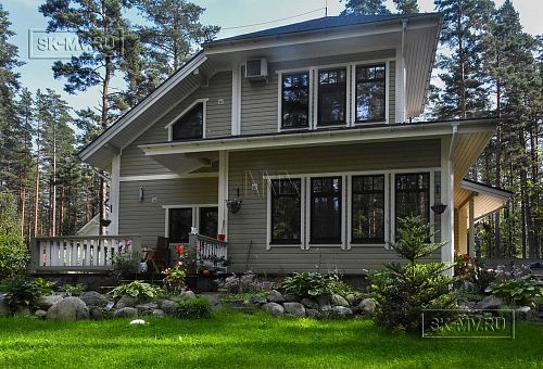 Построенный двухэтажный каркасный коттедж в комаровском стиле в п Комарово - 36