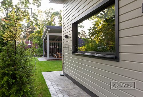 Фотографии П-образного дома в скандинавском стиле 238 кв м с панорамным остеклением, построенного в Сестрорецке - 8