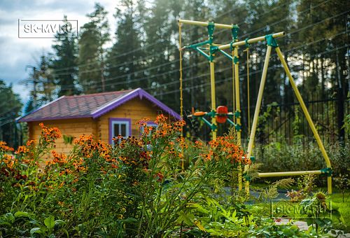 Построенный газобетонный дом в классическом стиле с эркером, балконом, навесом для автомобиля, остекленной верандой и комбинированной фасадной отделкой в кп Сосновое - 14