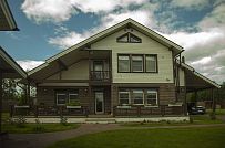 Строительство двухэтажного каркасного коттеджа шале около 300 кв м с комбинированной отделкой коричневым кирпичом и деревом в п Володарский - мини - 19