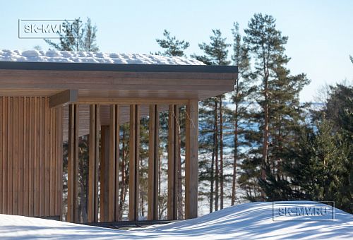 Построенный современный энергоэффективный загородный дом класса премиум с отделкой планкеном в Выборгском районе - 48