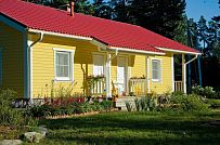 Строительство одноэтажного каркасного дома 95 кв м с фасадной отделкой желтой отделочной доской в г. Приозерск - мини - 9