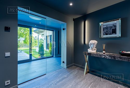 Пример внутренней отделки П-образного загородного дома в Сестрорецке - 7