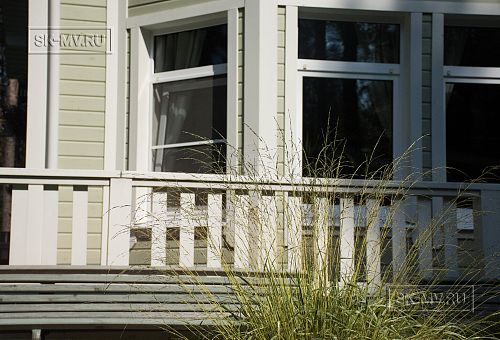 Построенный каркасный дом с комбинированной фасадной отделкой кирпичом и вагонкой в п Комарово - 2