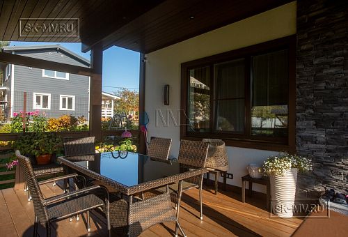 Построенный загородный дом с террасой по каркасной технологии в Сестрорецке под ключ - 7