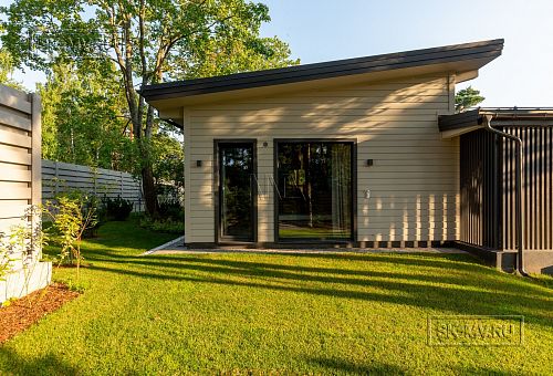 Фотографии П-образного дома в скандинавском стиле 238 кв м с панорамным остеклением, построенного в Сестрорецке - 13