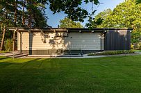 Фотографии П-образного дома в скандинавском стиле 238 кв м с панорамным остеклением, построенного в Сестрорецке - мини - 18