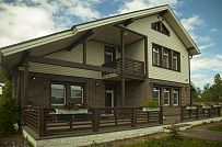 Строительство двухэтажного каркасного коттеджа шале около 300 кв м с комбинированной отделкой коричневым кирпичом и деревом в п Володарский - мини - 13