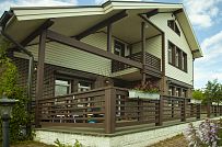 Строительство двухэтажного каркасного коттеджа шале около 300 кв м с комбинированной отделкой коричневым кирпичом и деревом в п Володарский - мини - 11