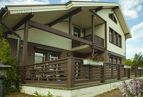 Строительство двухэтажного каркасного коттеджа шале около 300 кв м с комбинированной отделкой коричневым кирпичом и деревом в п Володарский - 11