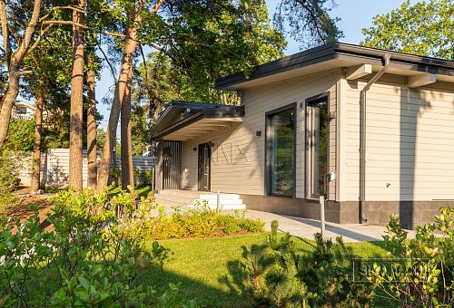 Фотографии П-образного дома в скандинавском стиле 238 кв м с панорамным остеклением, построенного в Сестрорецке - 17