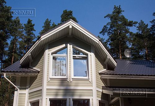 Построенный каркасный дом с комбинированной фасадной отделкой кирпичом и вагонкой в п Комарово - 4