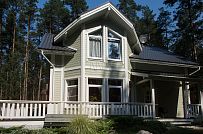 Построенный каркасный дом с комбинированной фасадной отделкой кирпичом и вагонкой в п Комарово - мини - 11