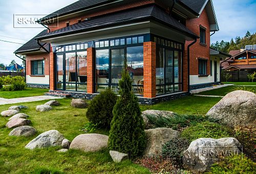 Строительство двухэтажного дома из газобетона с верандой с панорамным остеклением в КП Сосновое - 2