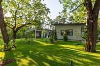 Фотографии П-образного дома в скандинавском стиле 238 кв м с панорамным остеклением, построенного в Сестрорецке - мини - 21