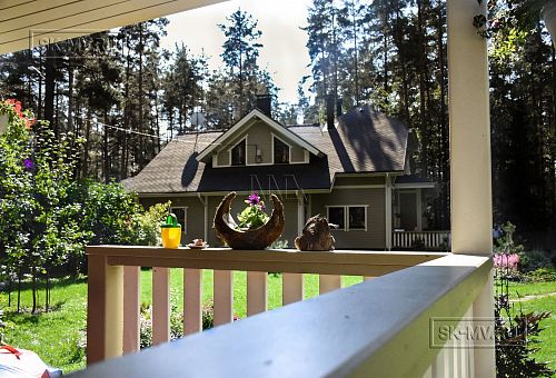 Построенный двухэтажный каркасный коттедж в комаровском стиле в п Комарово - 28