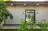 Фотографии П-образного дома в скандинавском стиле 238 кв м с панорамным остеклением, построенного в Сестрорецке - мини - 6