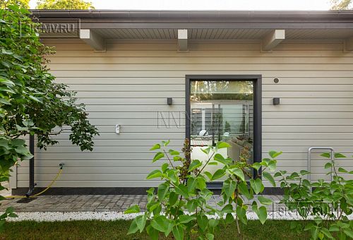 Фотографии П-образного дома в скандинавском стиле 238 кв м с панорамным остеклением, построенного в Сестрорецке - 6