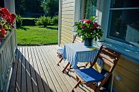 Строительство одноэтажного каркасного дома 95 кв м с фасадной отделкой желтой отделочной доской в г. Приозерск - мини - 6