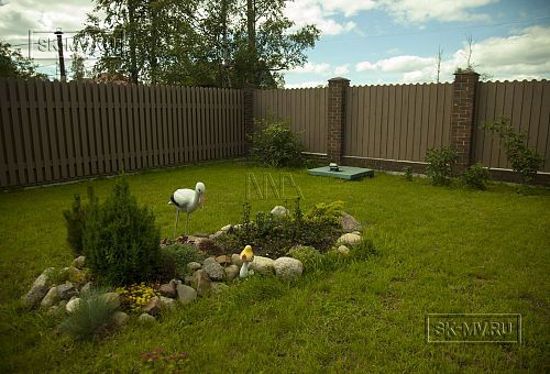 Строительство двухэтажного каркасного коттеджа шале около 300 кв м с комбинированной отделкой коричневым кирпичом и деревом в п Володарский - 4