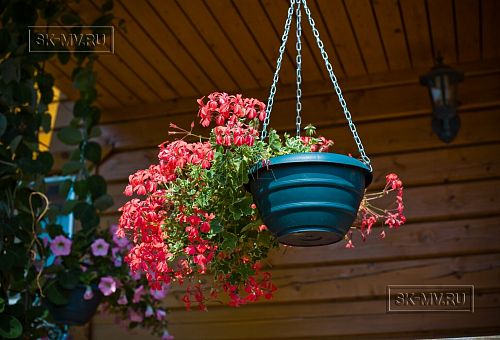 Построенный каркасный дом в п Озерное чуть более 170 кв.м с комбинированной отделкой бежевым кирпичом и зеленой отделочной доской, с террасой, навесом на два автомобиля и четырьмя спальнями - 10